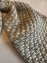 Load image into Gallery viewer, Close-up of a textured fabric with a checkered pattern on a neutral background