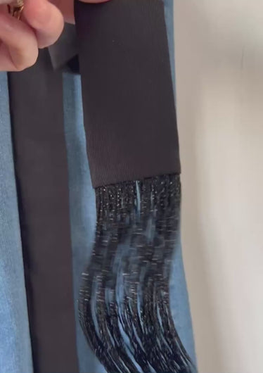 sparkling fringe on oversized black silk bow brooch
