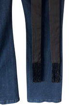 Load image into Gallery viewer, close up of fringe detail on the vesta silk bow brooch against blue jeans
